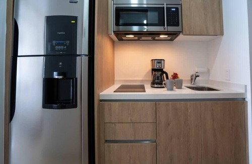 Gonzalo Guerrero Apartment | Studio Near 5th Ave, Infinity Roof Pool, Mini Gym!