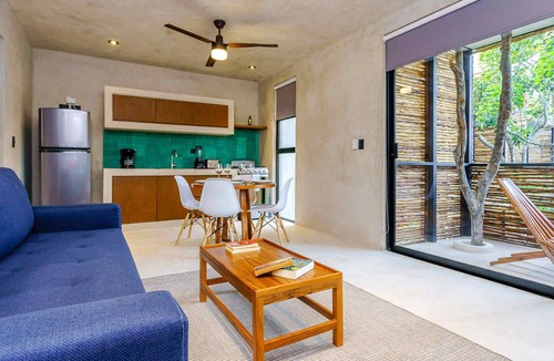 La Veleta Condo | Stylish Eco-Friendly Condo w/ Private Roof Lounge