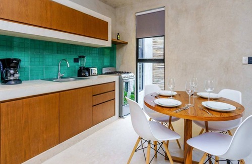 La Veleta Condo | Stylish Eco-Friendly Condo w/ Private Roof Lounge