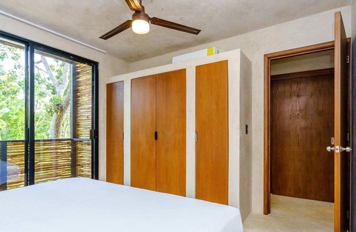 La Veleta Condo | Stylish Eco-Friendly Condo w/ Private Roof Lounge
