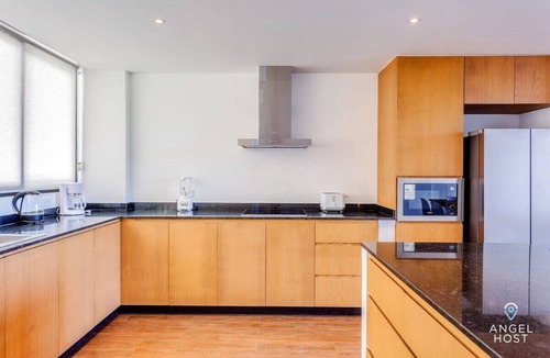 Luis Donaldo Colosio Condo | Stylish Oceanview Loft 2 Blocks to Beach & 5th Ave
