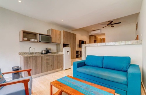 Centro Apartment | Stylish Playa Condo: Rooftop Pool, Gym, Near Beach