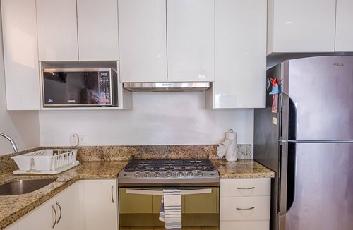 Akumal Condo | Stylish upscale condo on the beach, AC, swimming pool, beachfront!