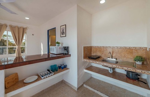 Colonia Meteorologico Apartment | Suites Ha, Suite Iguana, Relájate con el Confort y Disfruta de su Linda Terraza