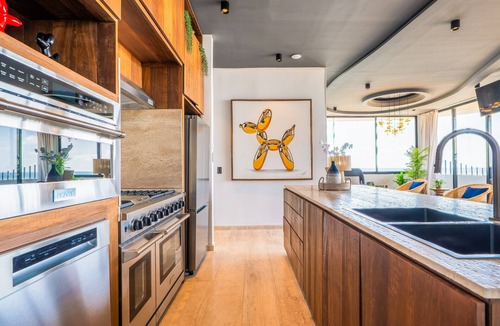 Tulsayab Condo | Surreal coastal apartment with local design, shared pool, hot tub, & dogs ok