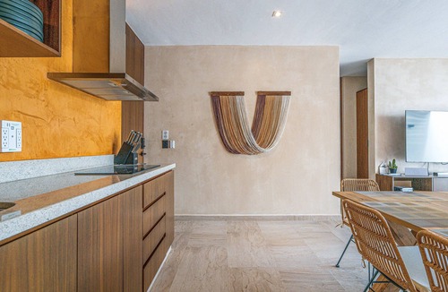 Tankah Apartment | Top level apartment with jacuzzi, shared pool, gym, & tennis courts