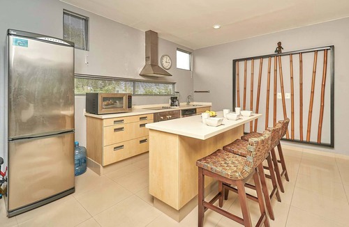 Playacar Fase II Apartment | Tranquil Stay with Pool, Private Terrace, and BBQ