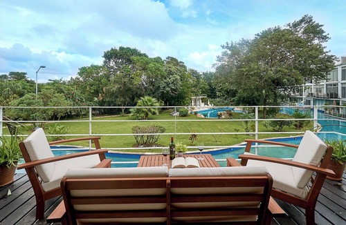 Playacar Fase II Apartment | Tranquil Stay with Pool, Private Terrace, and BBQ