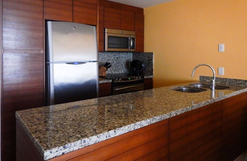 Isla Mujeres Condo | Unwind in luxury – penthouse overlooking Garrafon Reef Park