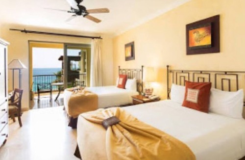 Playa Mujeres House | Villa Del palmar Cancun Luxury beach resort . 1 Suite 2 queen size beds.