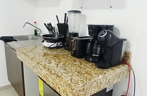 Downtown Cancun Hotel | Villa Leo Beautiful room with shared kitchenette, in the heart of Cancun