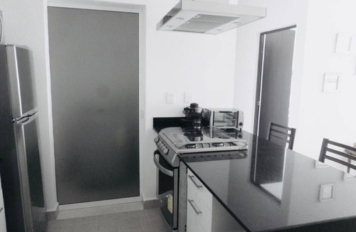 Puerto Juarez Apartment | Well equipped apartment minutes from the beach