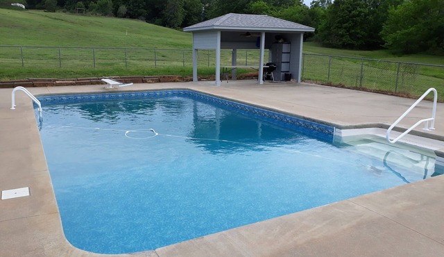 Country lake retreat with Pool and Boat Dock! Cozy + food/attractions nearby! in Checotah