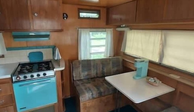 Mid-Century Holiday Trailer, Rustic Mid-Century RV in Story