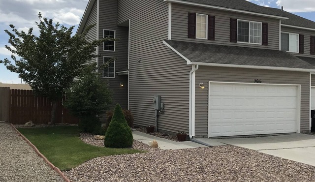Nice, quiet townhouse with garage. Nicely landscaped and fenced in backyard. in Rock Springs