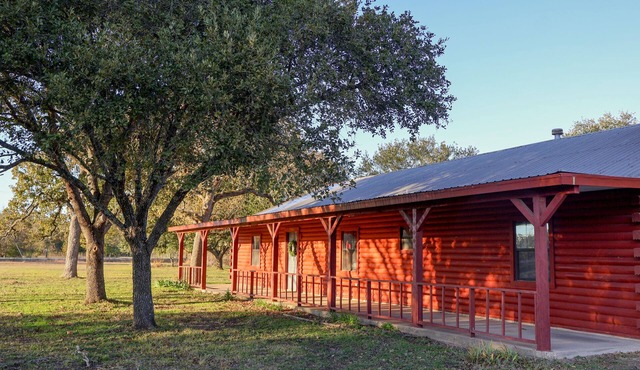 Rustic Log Cabin Near Texas A&M – Spacious Retreat with Pond & Firepit! in College Station