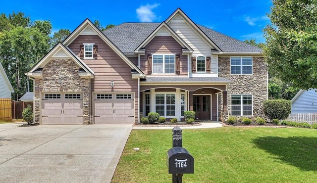 Stunning 4-Bedroom Retreat with Resort-Style Backyard in charming Evans. in Evans