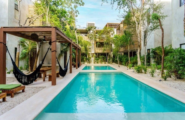 Eco Retreat: Rooftop Oasis, Pools, Near Beach&Town