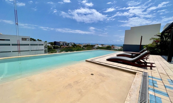 Playacar Fase I Apartment | Beautiful Studio with Roof Top Pool and Ocean Views