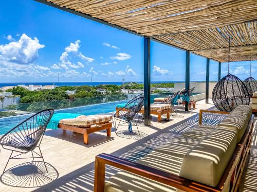 Centro Apartment | Big Studio at KAAB BY THE BEACH with roof top pool, sauna and Jacuzzi near Paseo del Carmen Mall