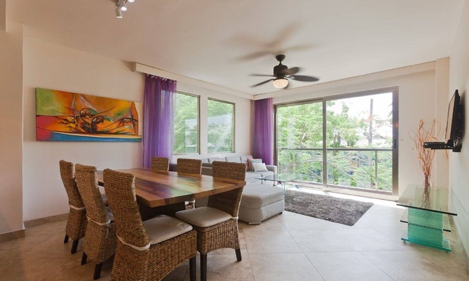 Gonzalo Guerrero Condo | Bright Modern Condo with balcony overlooking 5th Ave. 4 minute walk to the beach