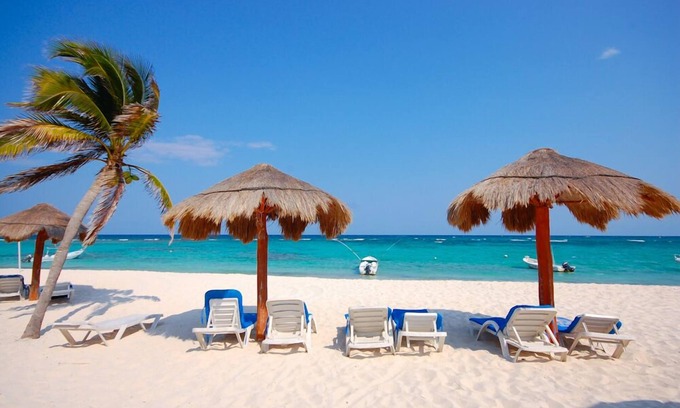 Akumal Condo | Charming, romantic beachfront studio with a king bed, AC and maid service.
