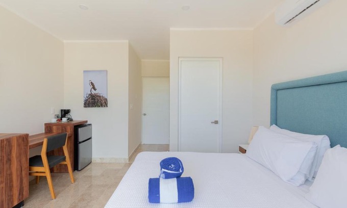 Zama Apartment | Comfy Room with Rooftop Pool, near Restaurants + Concierge