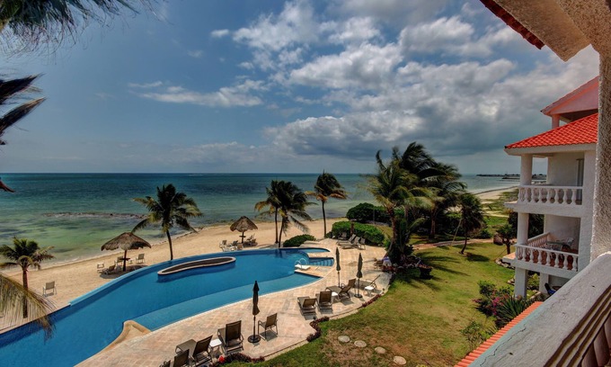Puerto Morelos Apartment | Condo #232 at Caribbean Reef Villas - OceanFront, huge pool for families/couples
