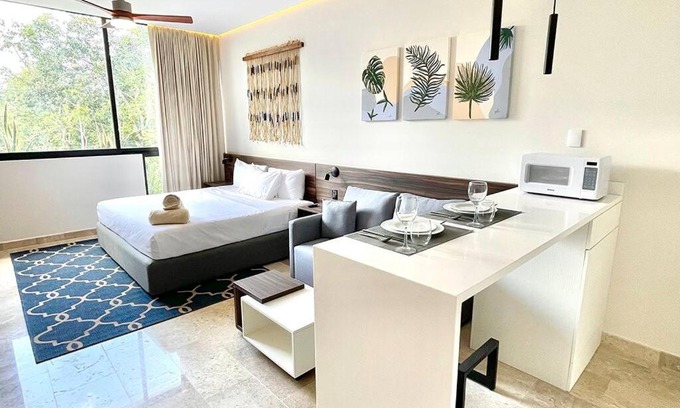 Zama Apartment | Fresh and Stylish Studio Aldea Zama rooftop pool Mya 109