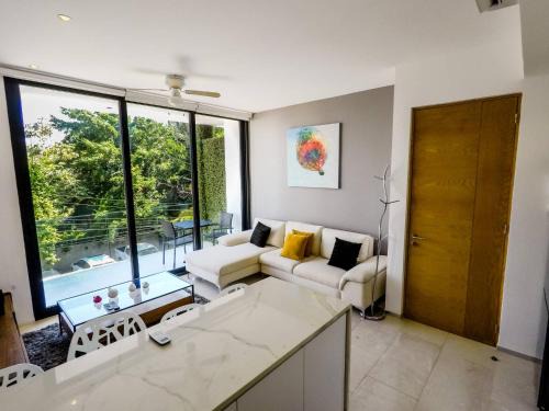 Gonzalo Guerrero Apartment | Lovely 1 Br apartment, 3 Blocks To Mamitas, Roof Pool Views, Bbq