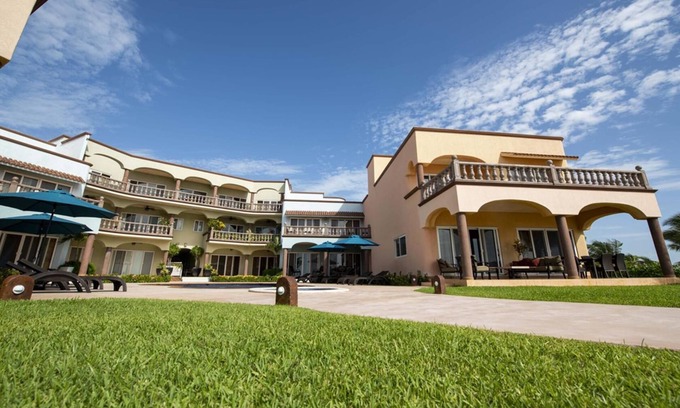 Puerto Morelos Condo | Luxury three bedroom villa facing the Caribbean Sea with a large terrace
