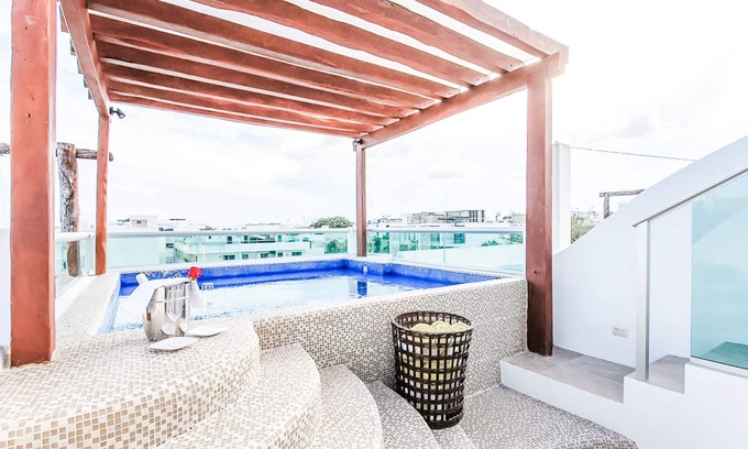 Downtown Apartment | MAGIC PARADISE MAMITAS BEACH AREA, Partial Ocean View from rooftop