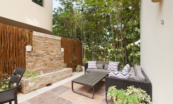 Gonzalo Guerrero Condo | Modern Condo w/ Large Private Patio on 5th Avenue. 4 min. Walk to the Beach!