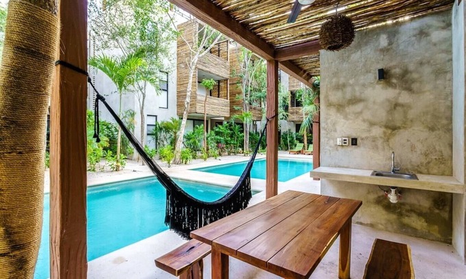 La Veleta Condo | Stylish Eco-Friendly Condo w/ Private Roof Lounge