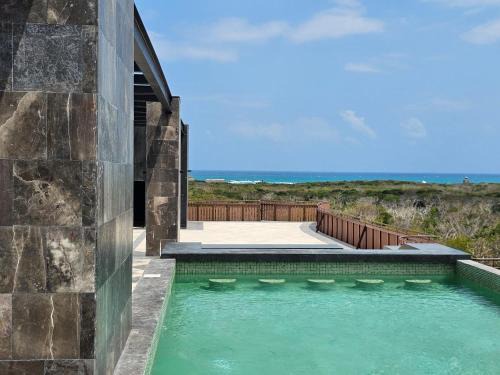Playa Paraiso Apartment | Tulumicondo 1Bdr Walk to the Beach Jaguar park