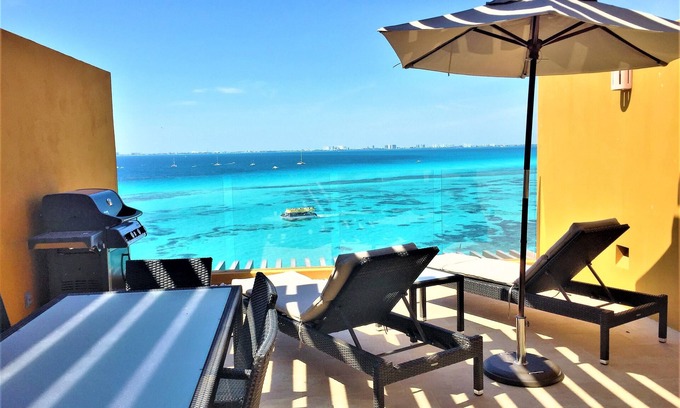 Isla Mujeres Condo | Unwind in luxury – penthouse overlooking Garrafon Reef Park