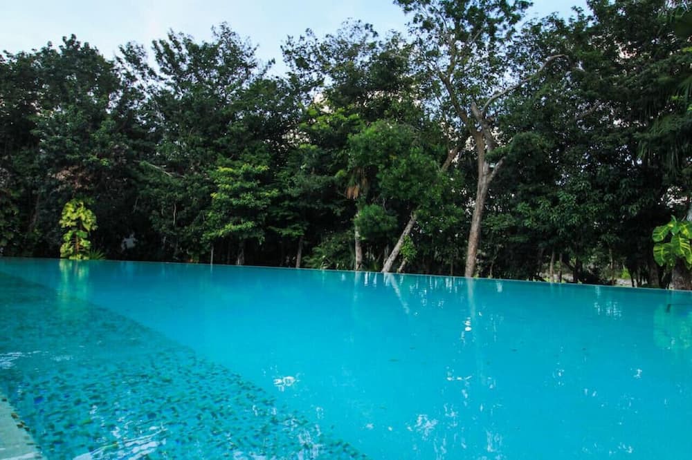 Akumal Apartment | Cheerful 2BR Home in Jungle Oasis w/Pool + Beach