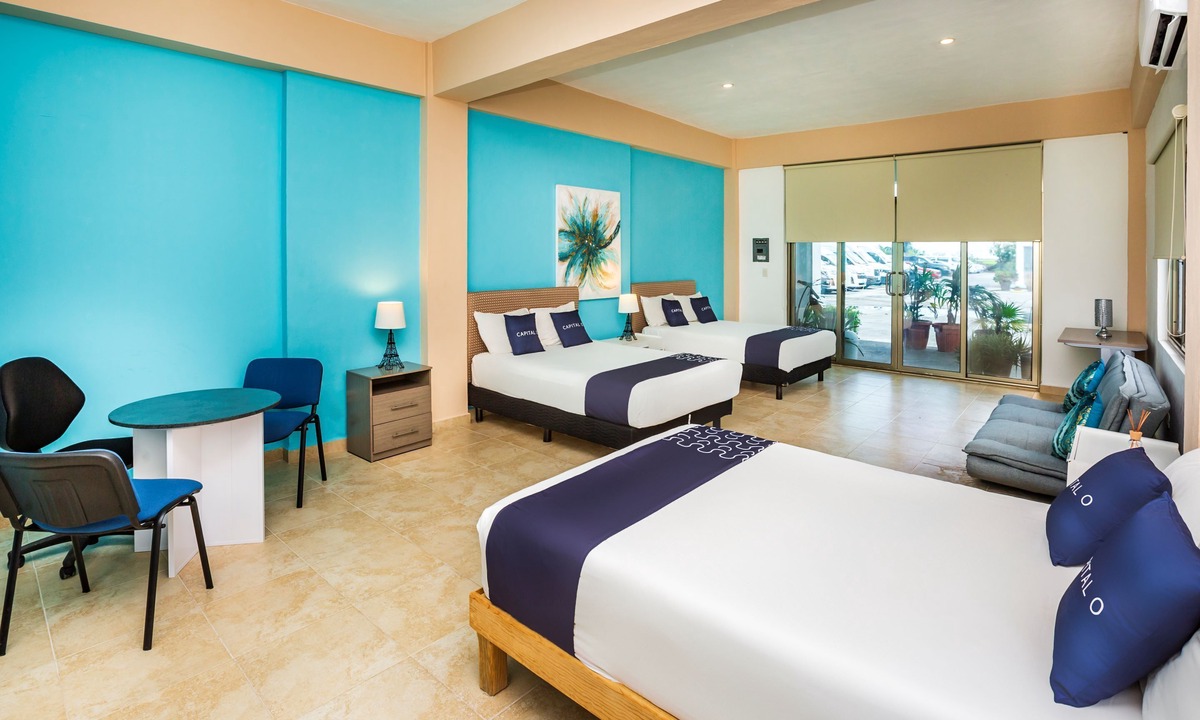 Alfredo V. Bonfil Hotel | Capital O Cancun International Airport 24/7,