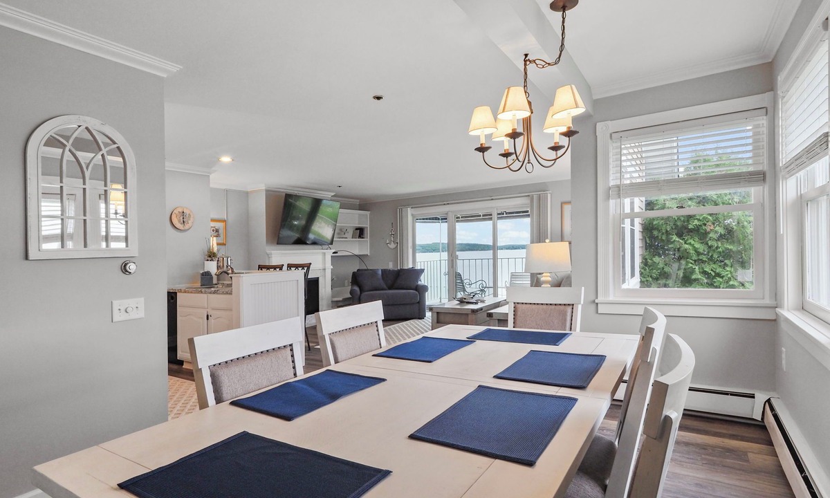 Boyne City Condo | 215 Water Street | Balcony Over Lake Charlevoix | Waterfront Stay | Fireplace