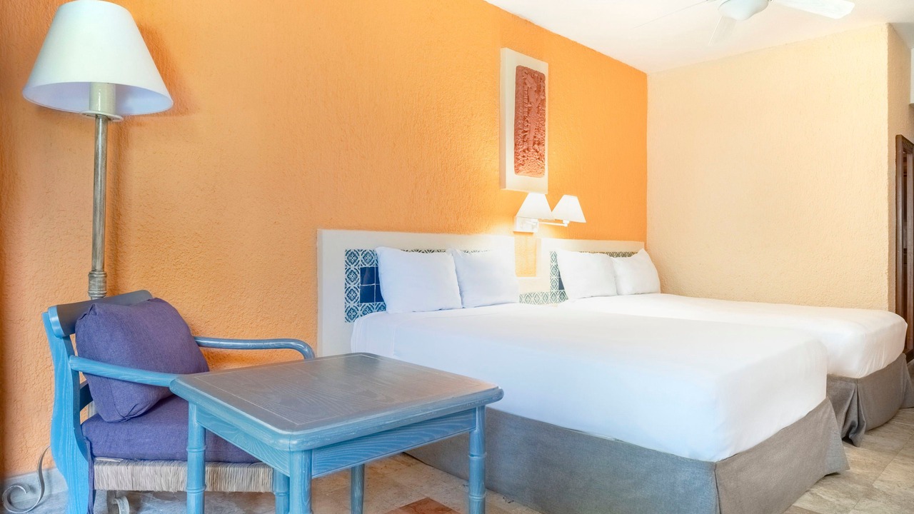 Photo of Bedroom in Playacar Zona Hotelera