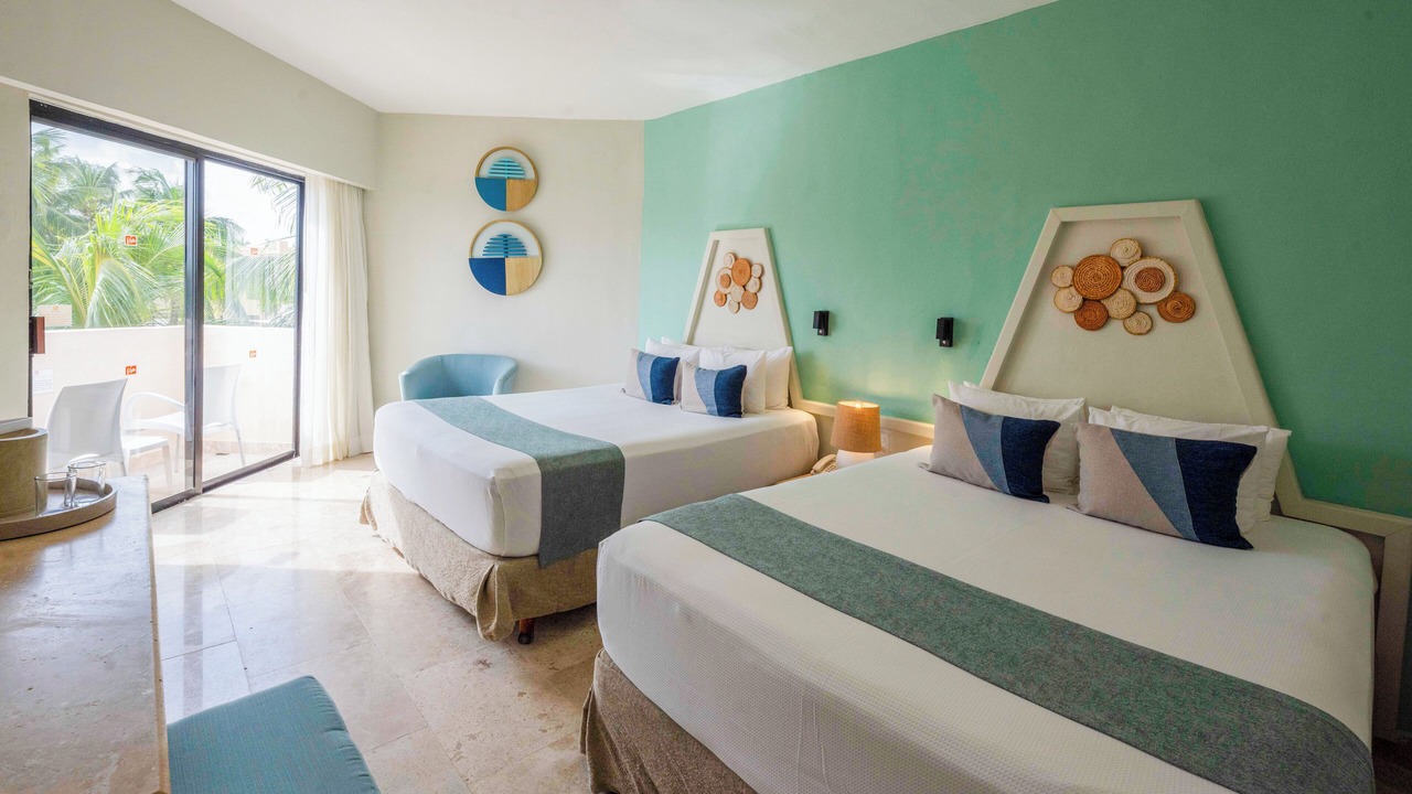 Photo of Bedroom in Playacar Zona Hotelera