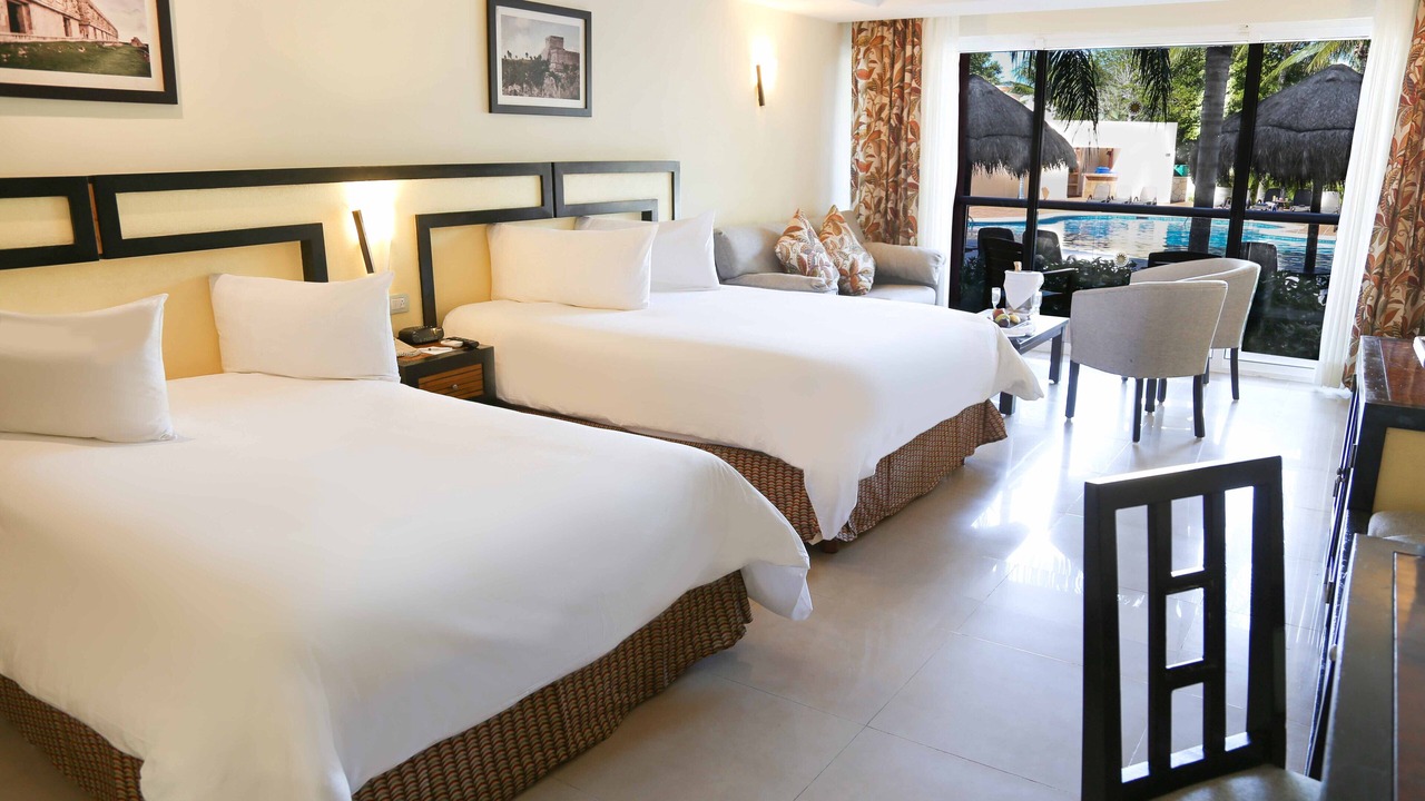 Photo of Bedroom in Playacar Zona Hotelera