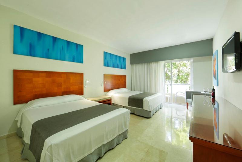 Photo of Bedroom in Playacar Zona Hotelera