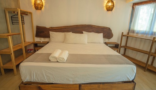 Room One (Junior Room, small balcony, partial sea view)