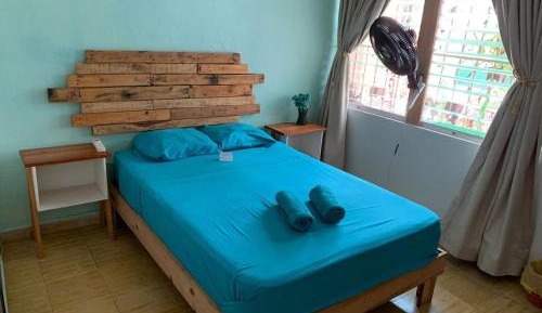 Double room with fans and shared bathroom