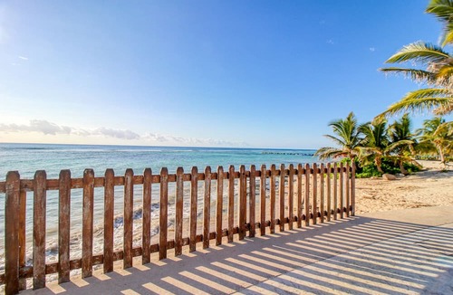 Majahual House | Spanish-style home with pool, W/D, 2 living areas & 2 kitchenettes - near beach
