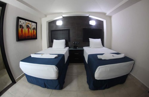 Colonia 5 de Diciembre Hotel | Hotel Portonovo Plaza Malecón