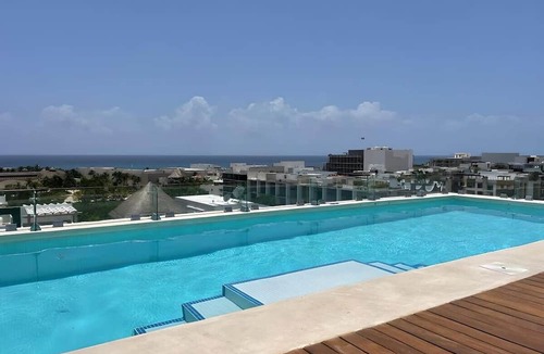 Luis Donaldo Colosio Apartment | Playa del Carmen Studio: Rooftop Pool & Beach