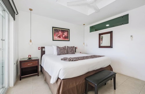 Colonia Andres Condo | Spectacular Top Floor Oceanfront One Bedroom Penthouse in Downtown Cozumel