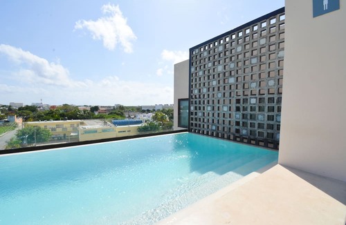 Ejidal Apartment | Relax and Recharge: Your Modern Oasis with A/C in Playa del Carmen